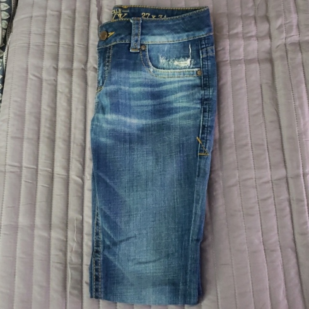 Buckle Black skinny jeans 27x34